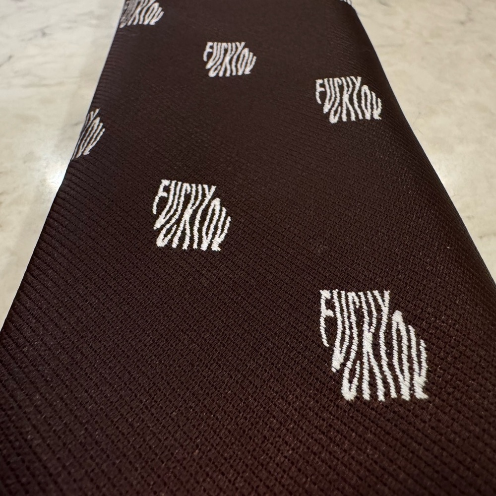 Neck tie that says F*** Y**
